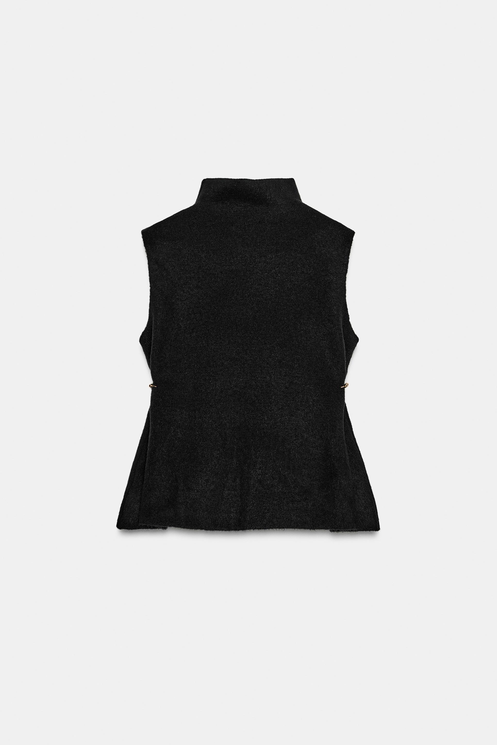 ASYMMETRIC KNIT TOP WITH SIDE APPLIQUÉS